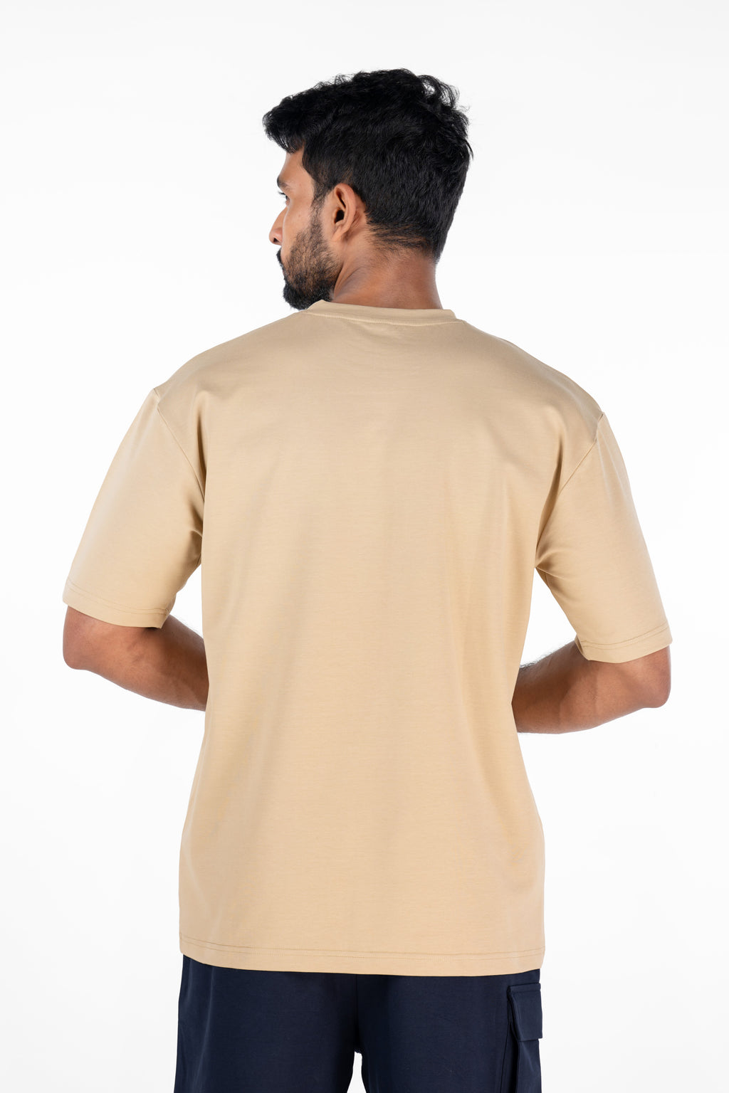 Bullish MILF Pump Cover in Beige — oversized athletic pump cover for gym wear