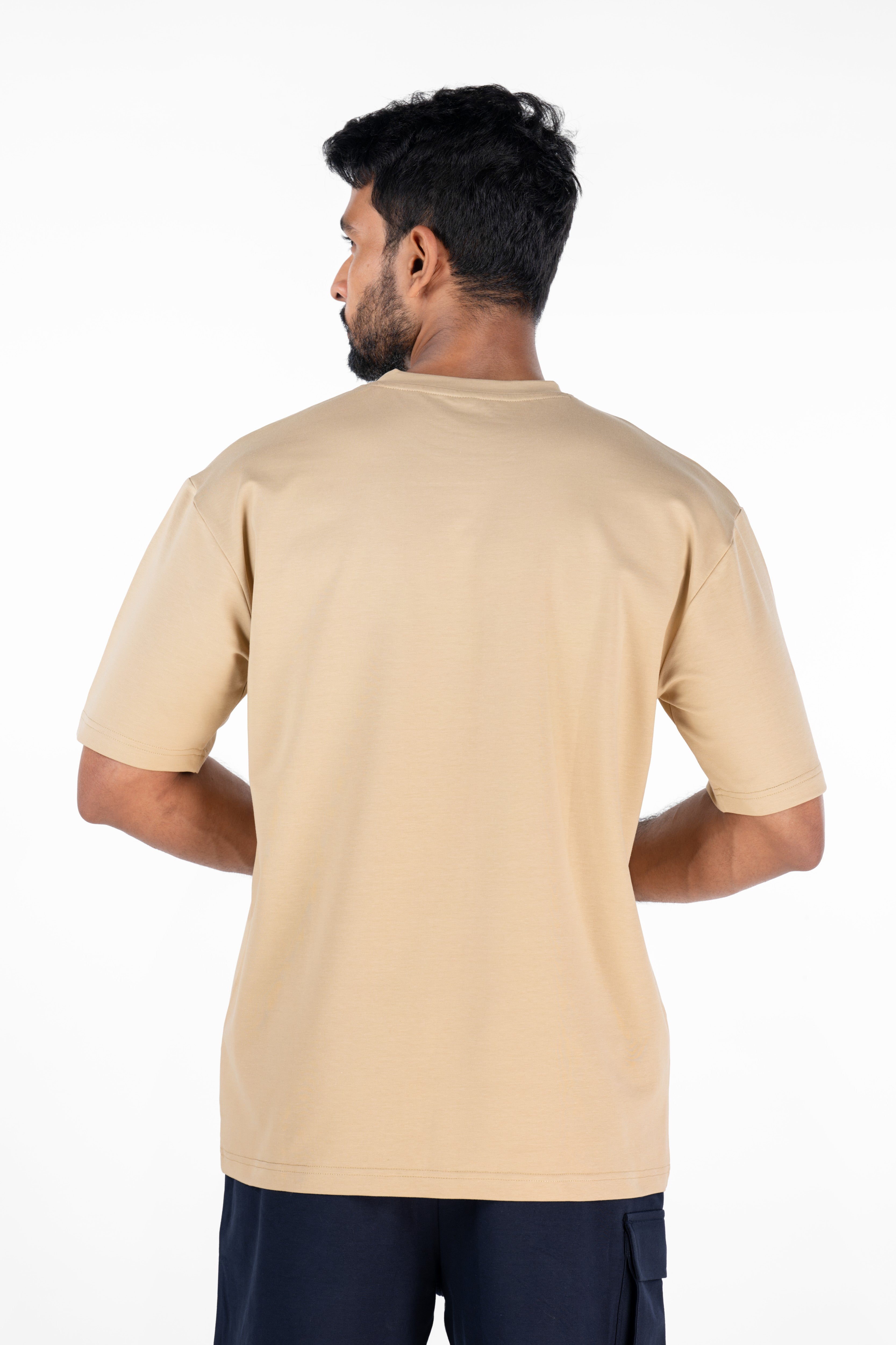 Bullish MILF Pump Cover in Beige — oversized athletic pump cover for gym wear
